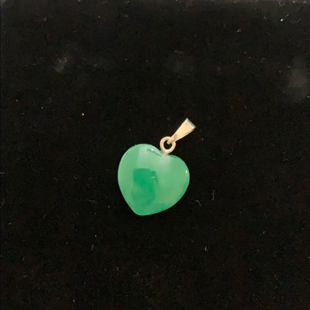 Emerald color heart shape pendant. 14k gold
